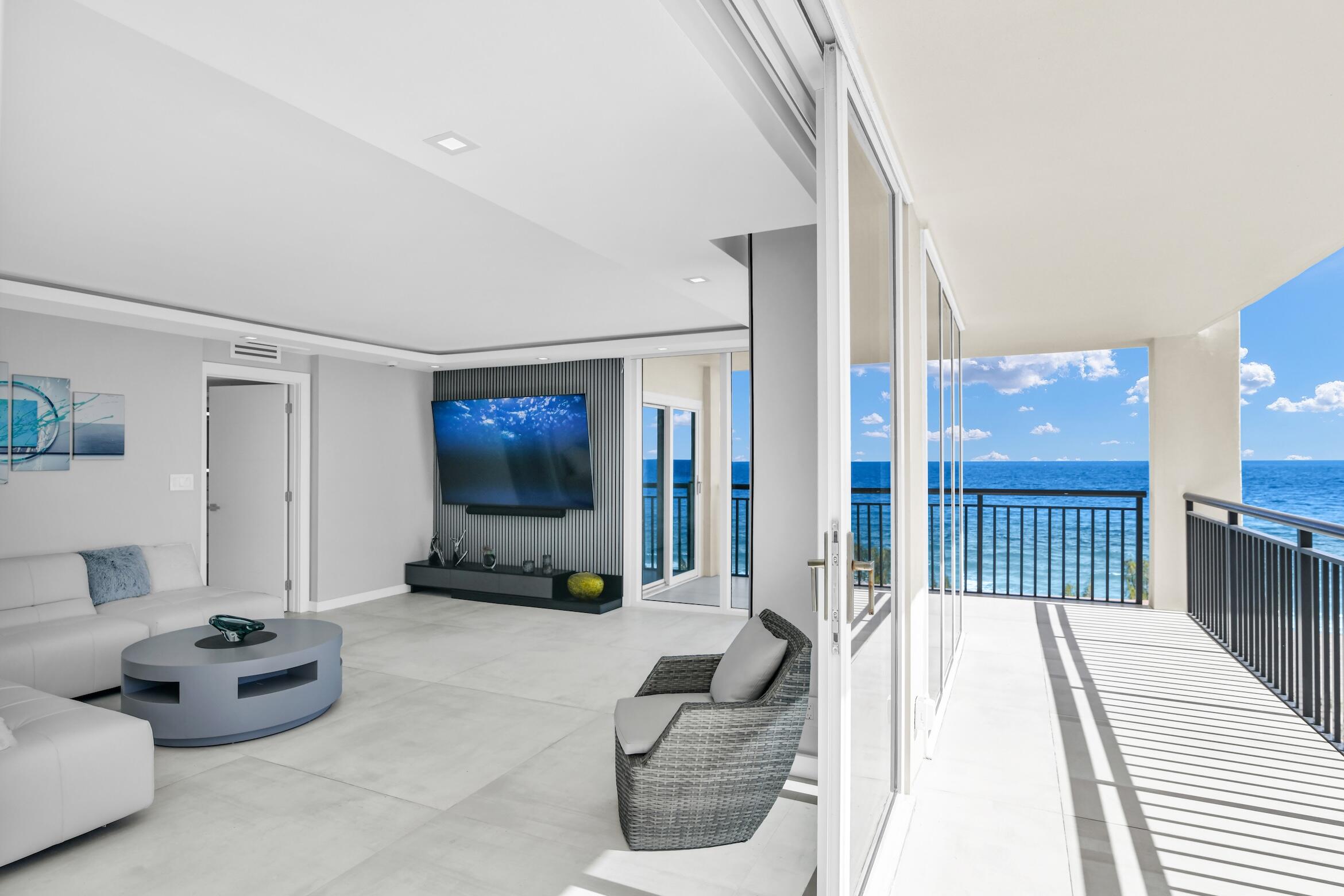 2000 South Ocean Boulevard, Unit 6K Boca Raton, FL 33432 - Photo 36 of 93 a living room with furniture and a flat screen tv