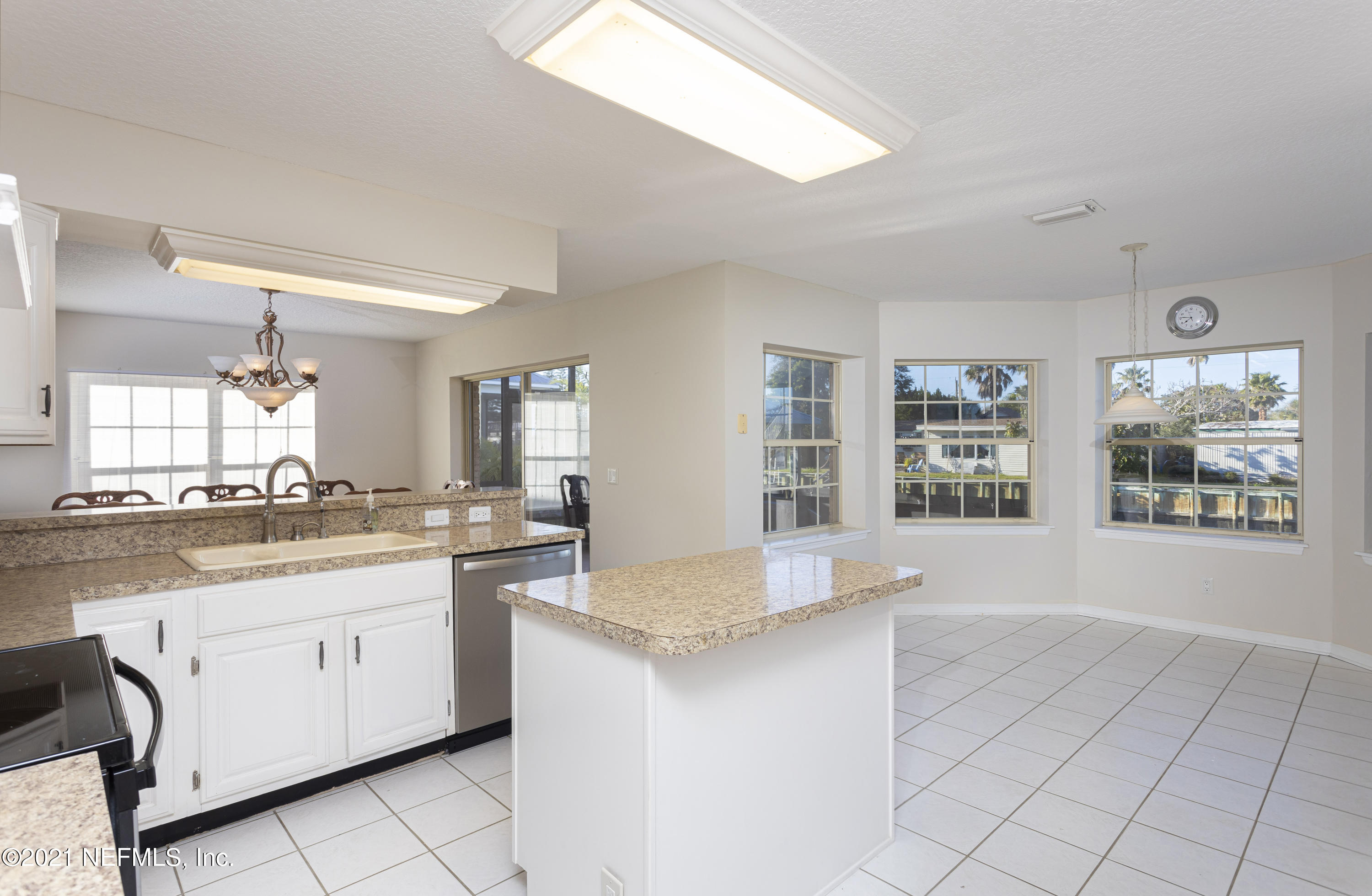 6348 Salado Road St. Augustine, FL 32080 - Photo 16 of 48 a view of kitchen with granite countertop cabinets and sink