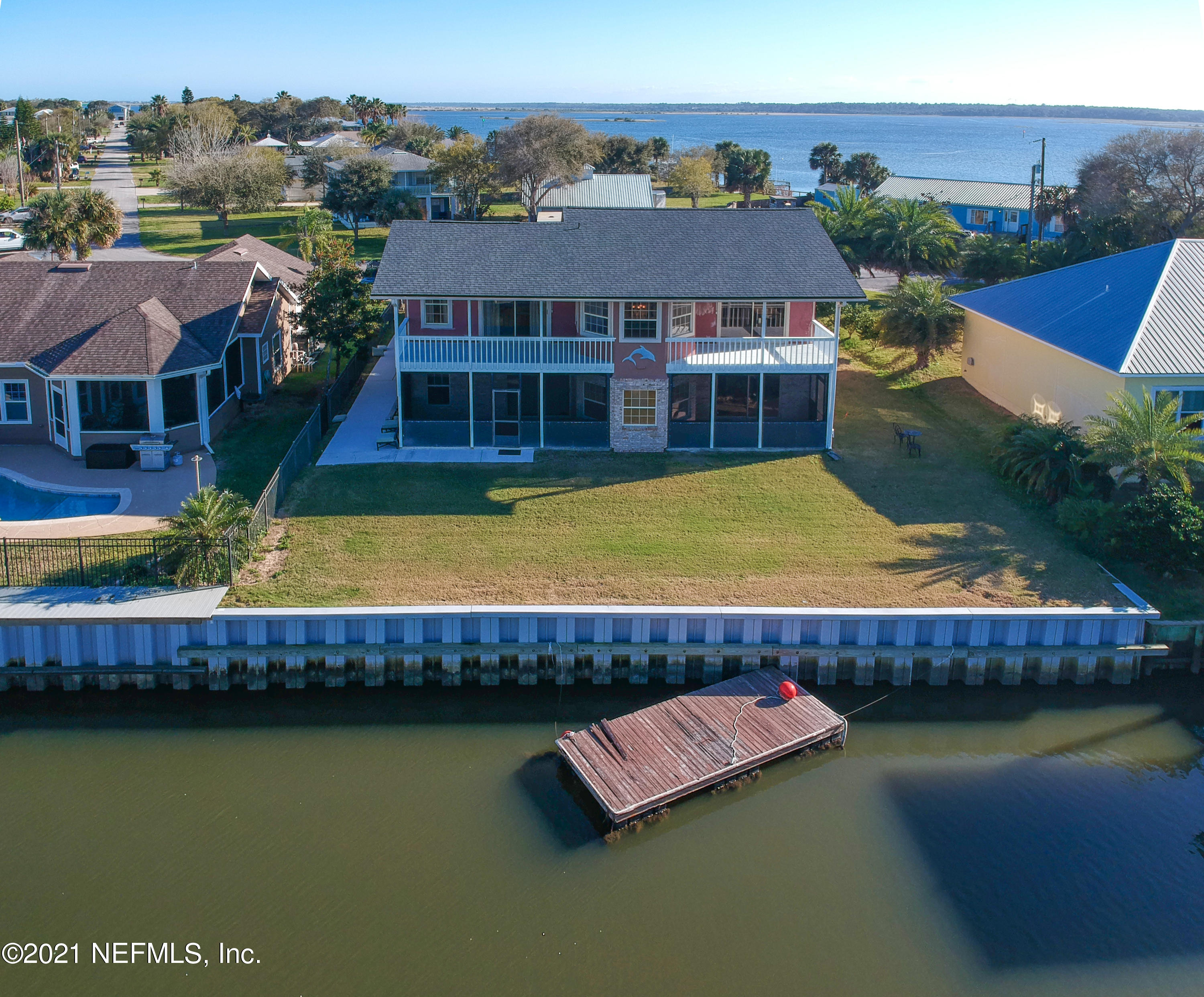6348 Salado Road St. Augustine, FL 32080 - Photo 3 of 48 a view of a house with pool and a yard