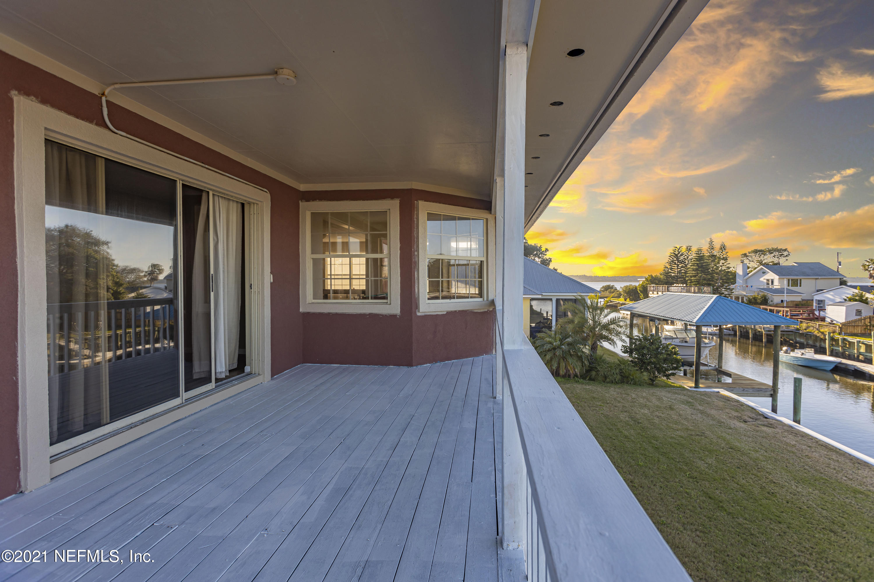 6348 Salado Road St. Augustine, FL 32080 - Photo 42 of 48 a view of a porch with wooden floor and city view
