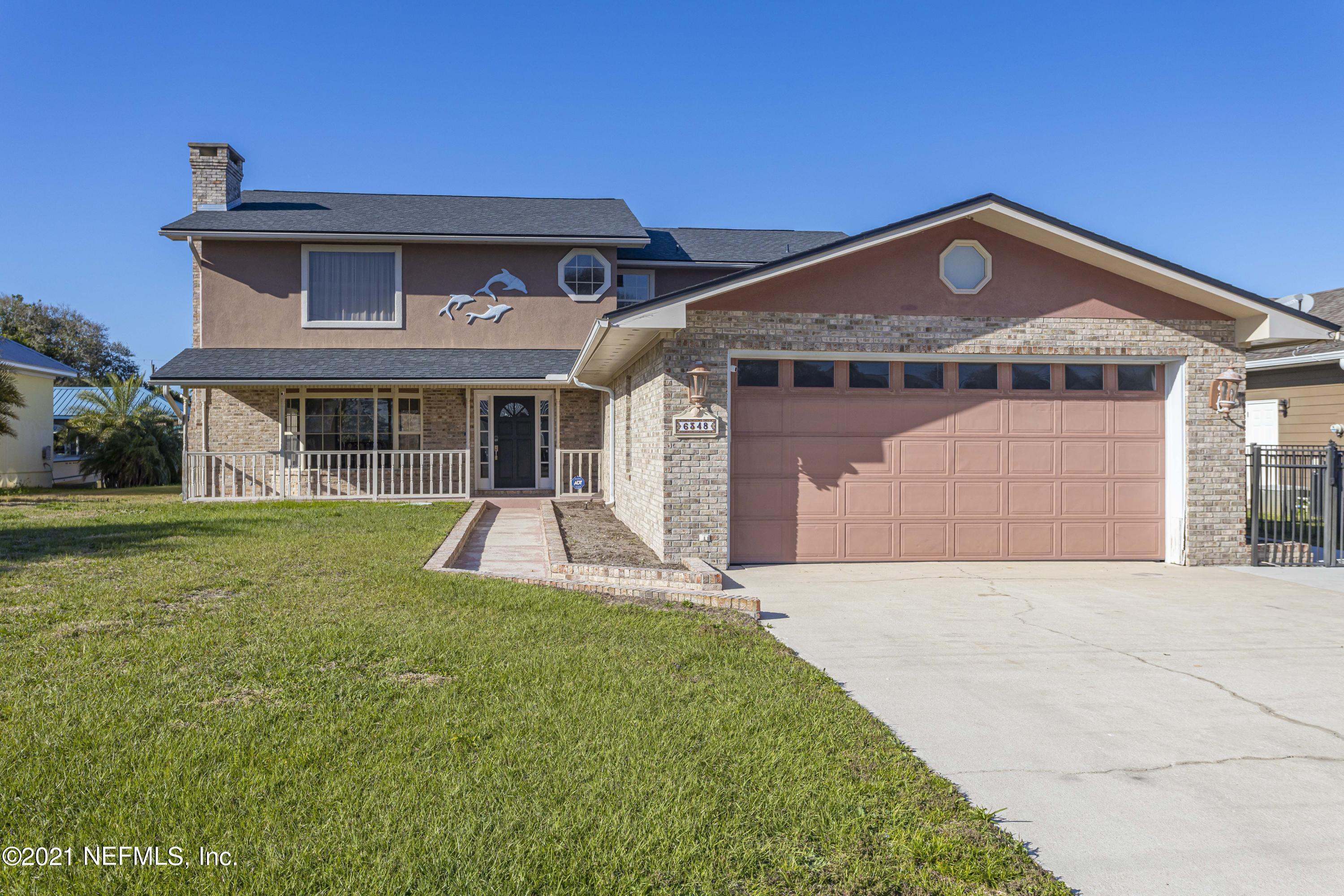 6348 Salado Road St. Augustine, FL 32080 - Photo 47 of 48 a front view of a house with a yard