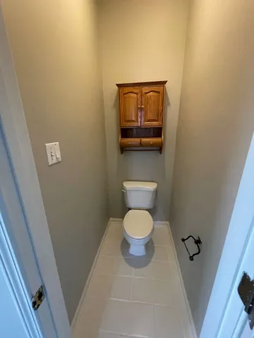 a bathroom with a toilet and a sink