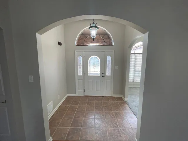 a view of entryway with front door