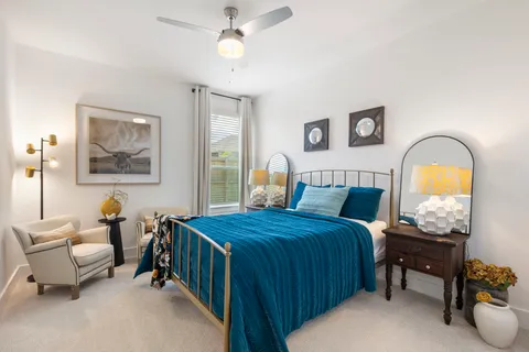 a view of a patio with a table and chairs