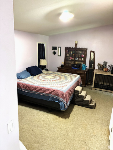547 East 2000th Street North Vernal, UT 84078 - Photo 13 of 50 Carpeted room with light purple walls
