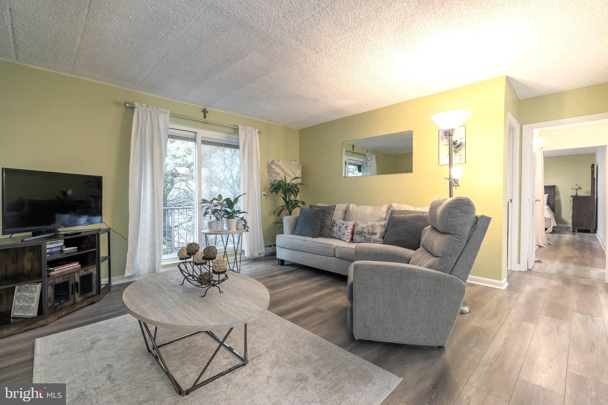 400 Glendale Road, Unit A54 Havertown, PA 19083 - Photo 2 of 21 Living Room with Balcony