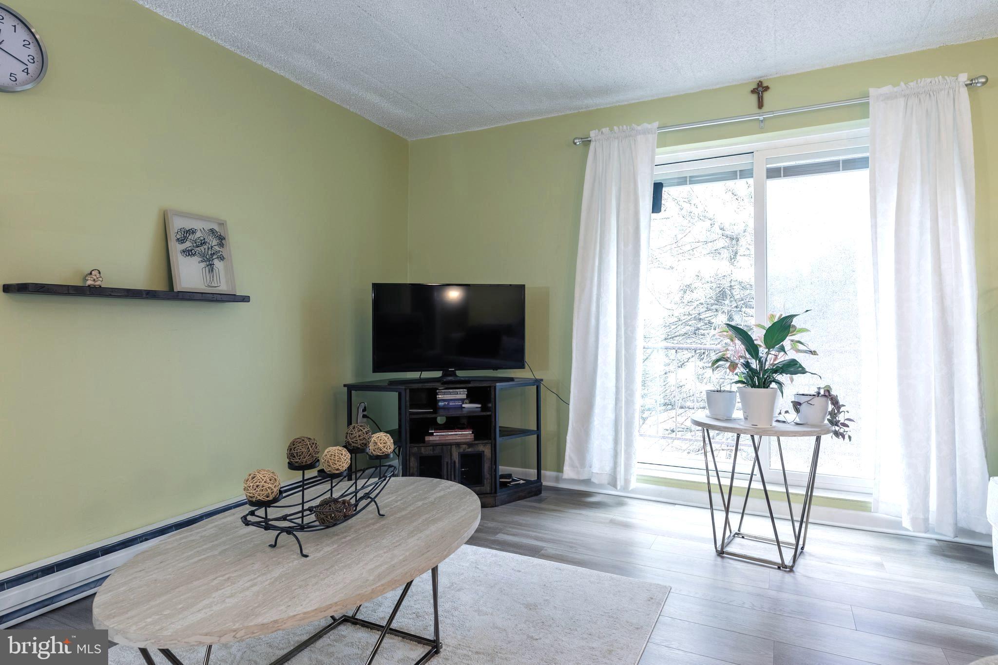 400 Glendale Road, Unit A54 Havertown, PA 19083 - Photo 3 of 21 Living Room with Balcony