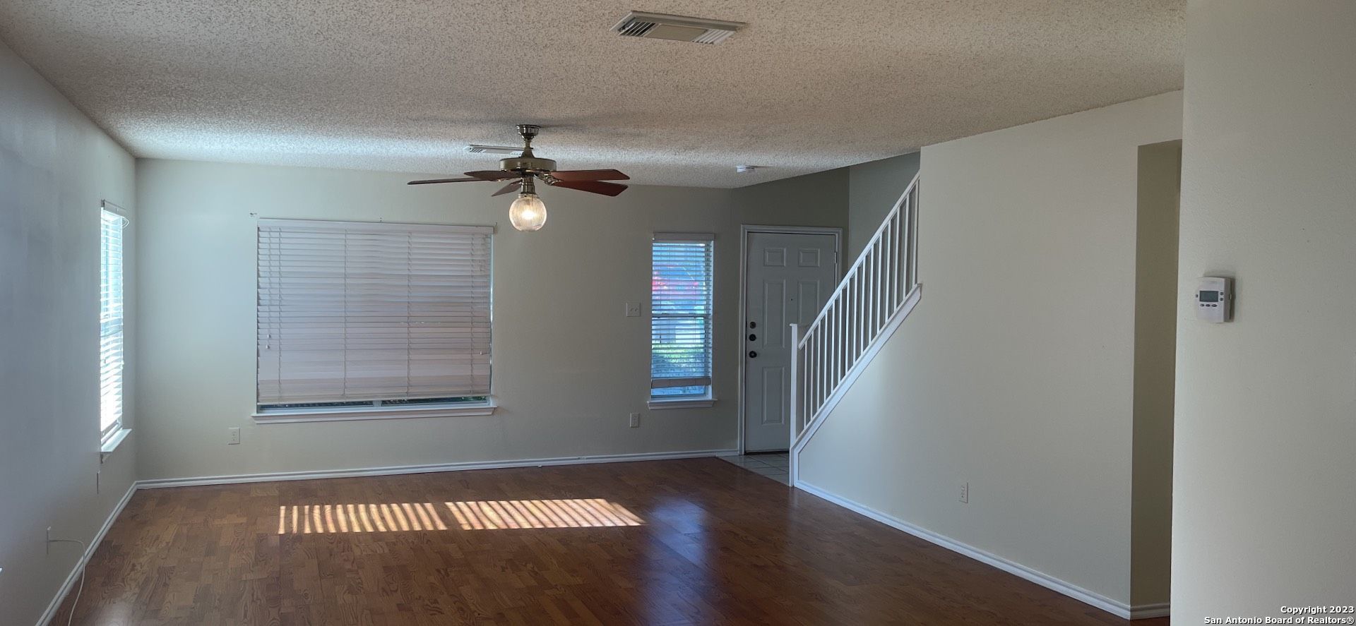8615 Cross Spring San Antonio, TX 78251 - Photo 2 of 15 a view of an empty room with a window