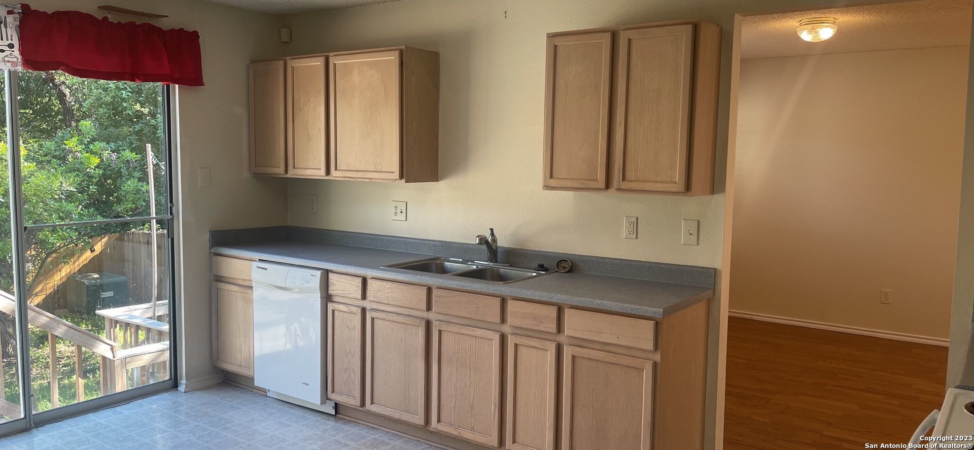 8615 Cross Spring San Antonio, TX 78251 - Photo 5 of 15 a bathroom with a granite countertop sink and a mirror