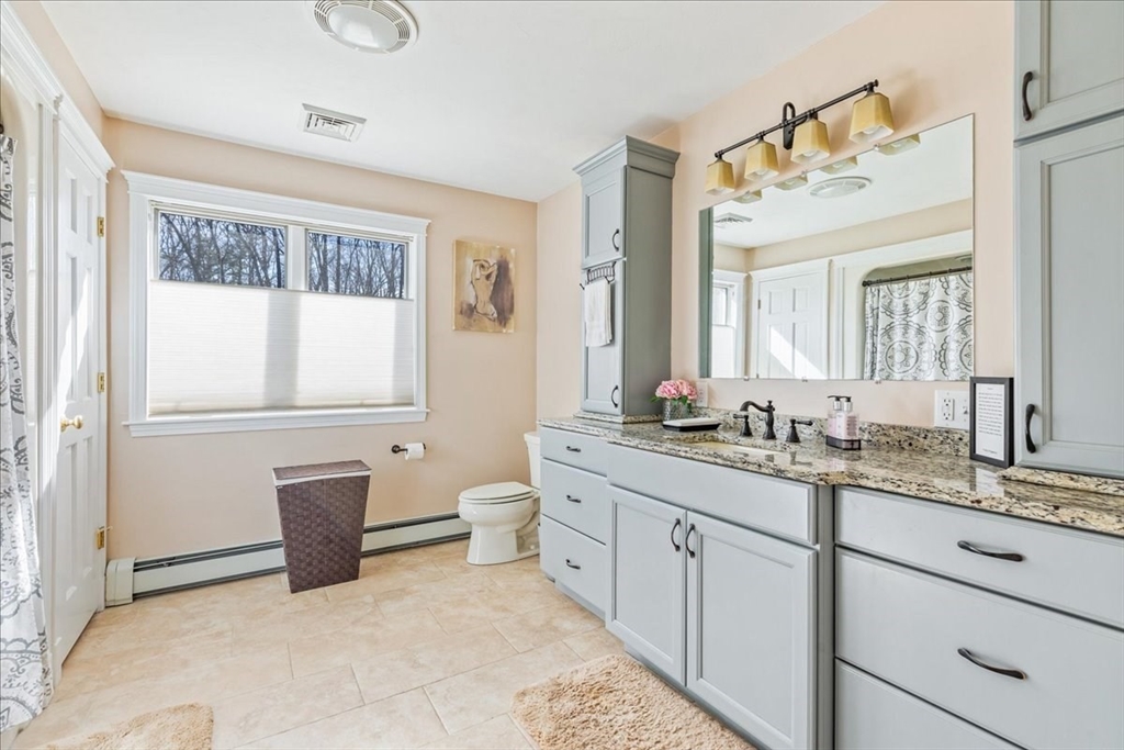 14 Robinson Road Rochester, MA 02770 - Photo 24 of 42 a bathroom with a granite countertop sink mirror and a toilet