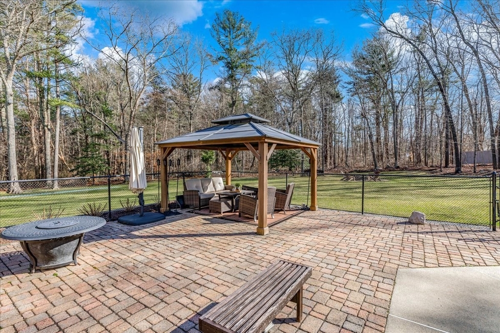 14 Robinson Road Rochester, MA 02770 - Photo 29 of 42 a view of a house with backyard porch and sitting area