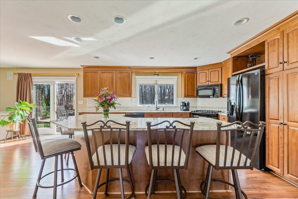14 Robinson Road Rochester, MA 02770 - Photo 6 of 42 a view of a dining room with furniture window and outside view