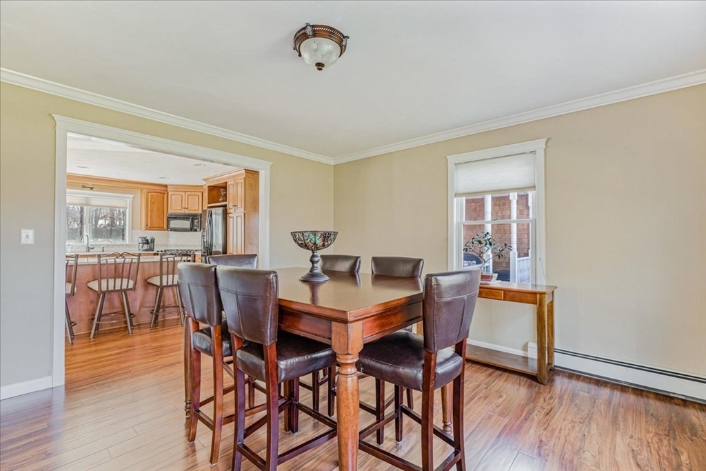 14 Robinson Road Rochester, MA 02770 - Photo 8 of 42 a view of a dining room with furniture and wooden floor