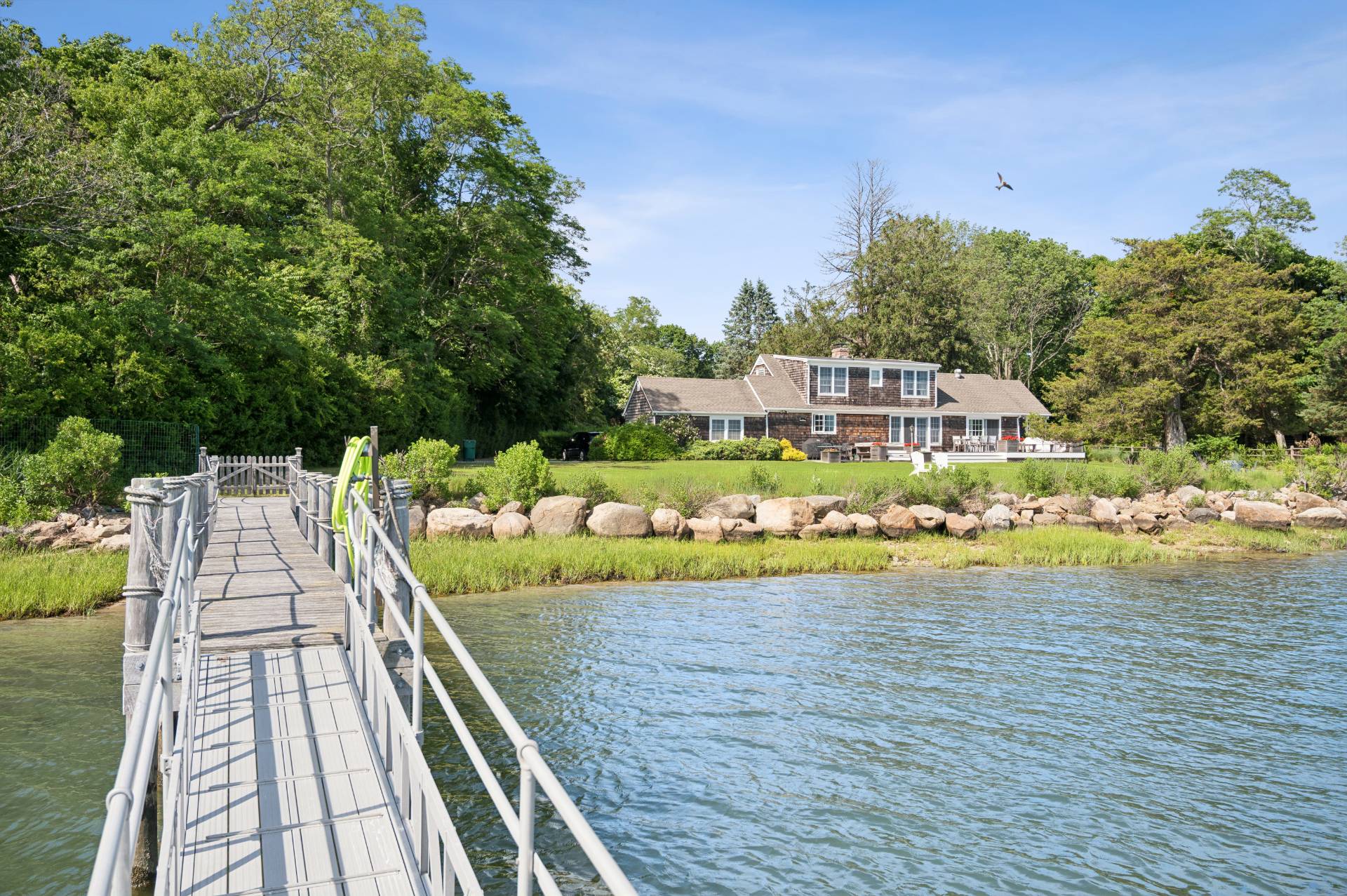 69 Ferry Road Sag Harbor, NY 11963 - Photo 2 of 17 a view of swimming pool with lounge chair