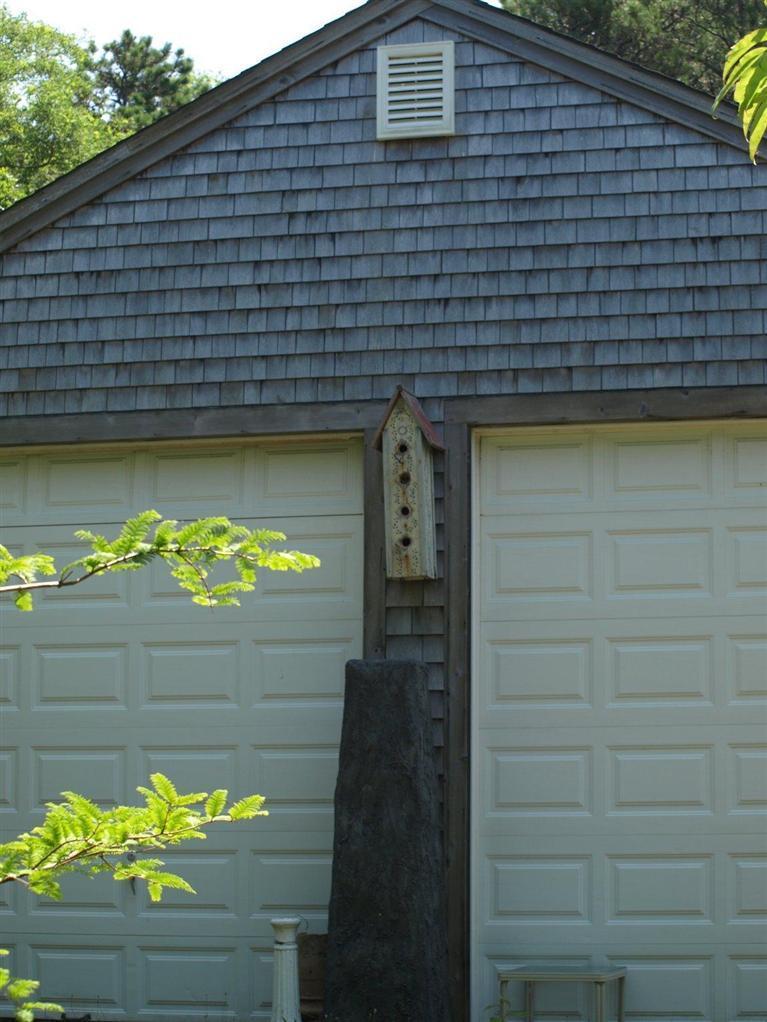 86 Shore Road, Unit 15 Truro, MA 02666 - Photo 7 of 23 a front view of a house with a window