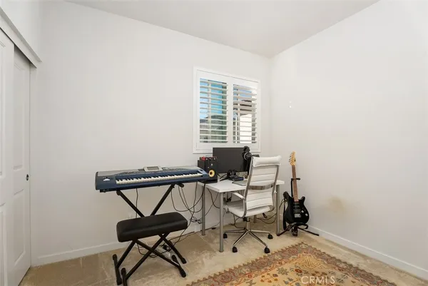 a work room with table and chairs