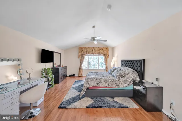 a living room with furniture fireplace and flat screen tv