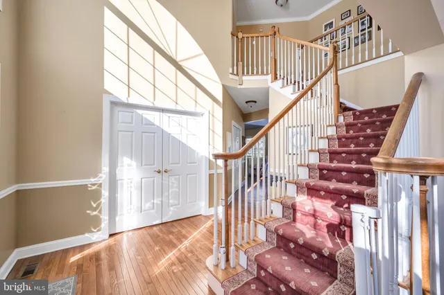 a view of entryway with wooden floor