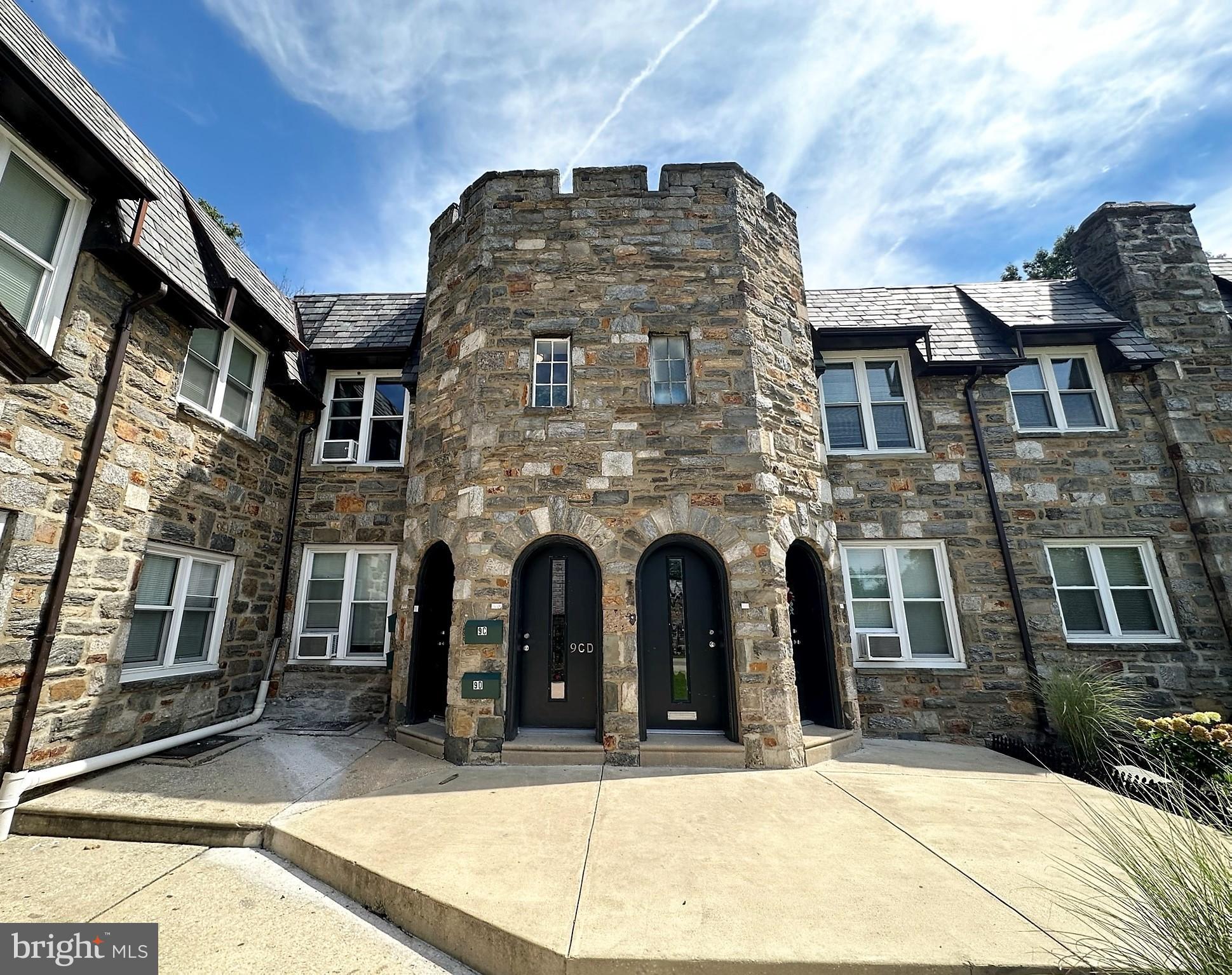 4927 Wynnefield Avenue, Unit 17A Philadelphia, PA 19131 - Photo 2 of 24 a tall building with glass windows