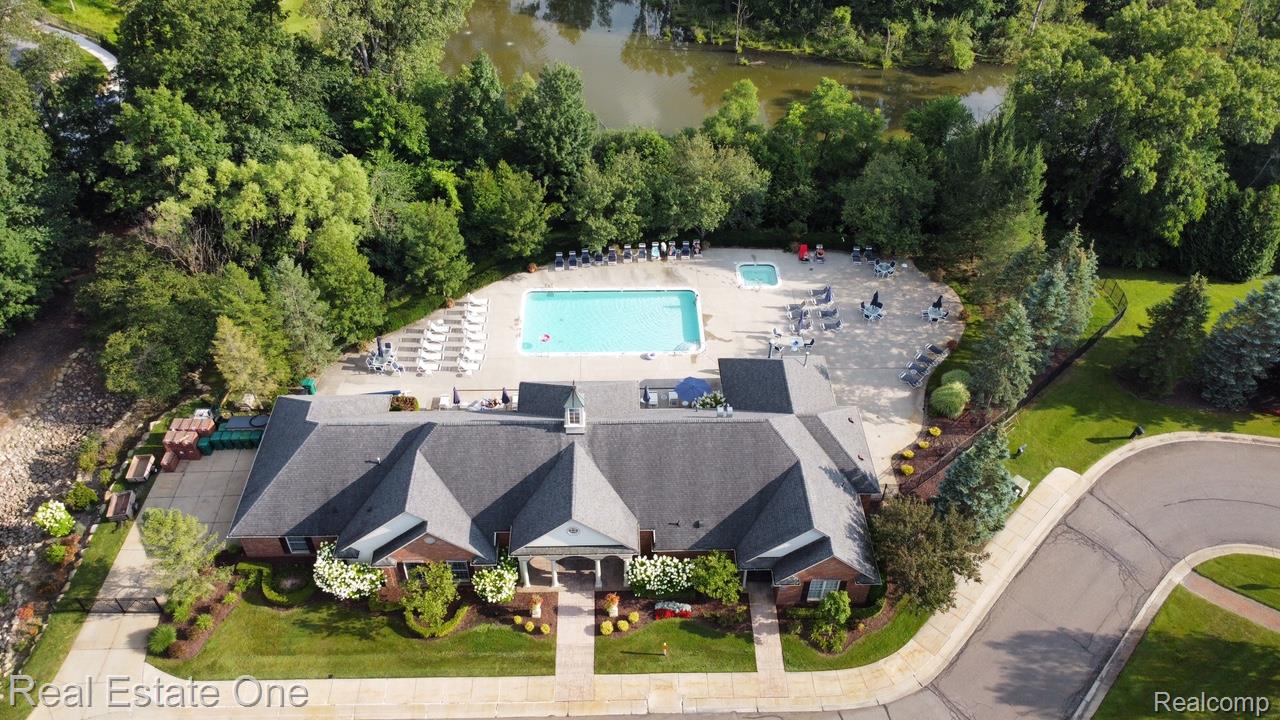 3491 Tremonte Circle Rochester, MI 48306 - Photo 29 of 42 Aerial overview of property's location featuring a pool area and clubhouse