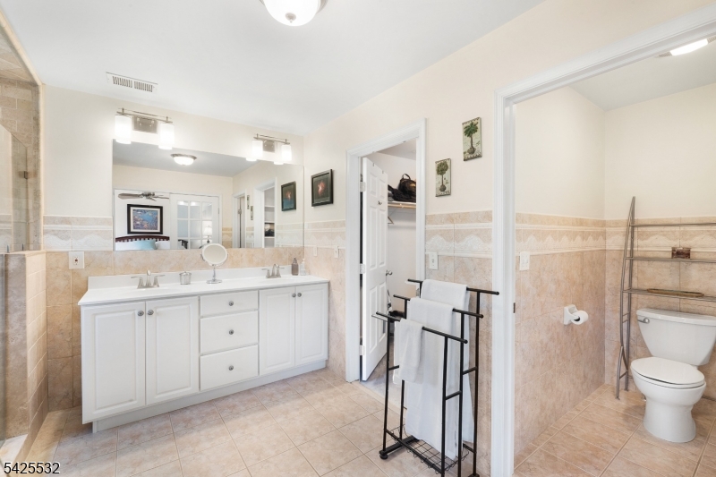 6 Ridge Road Frenchtown, NJ 08825 - Photo 20 of 33 a spacious bathroom with a shower sink and mirror