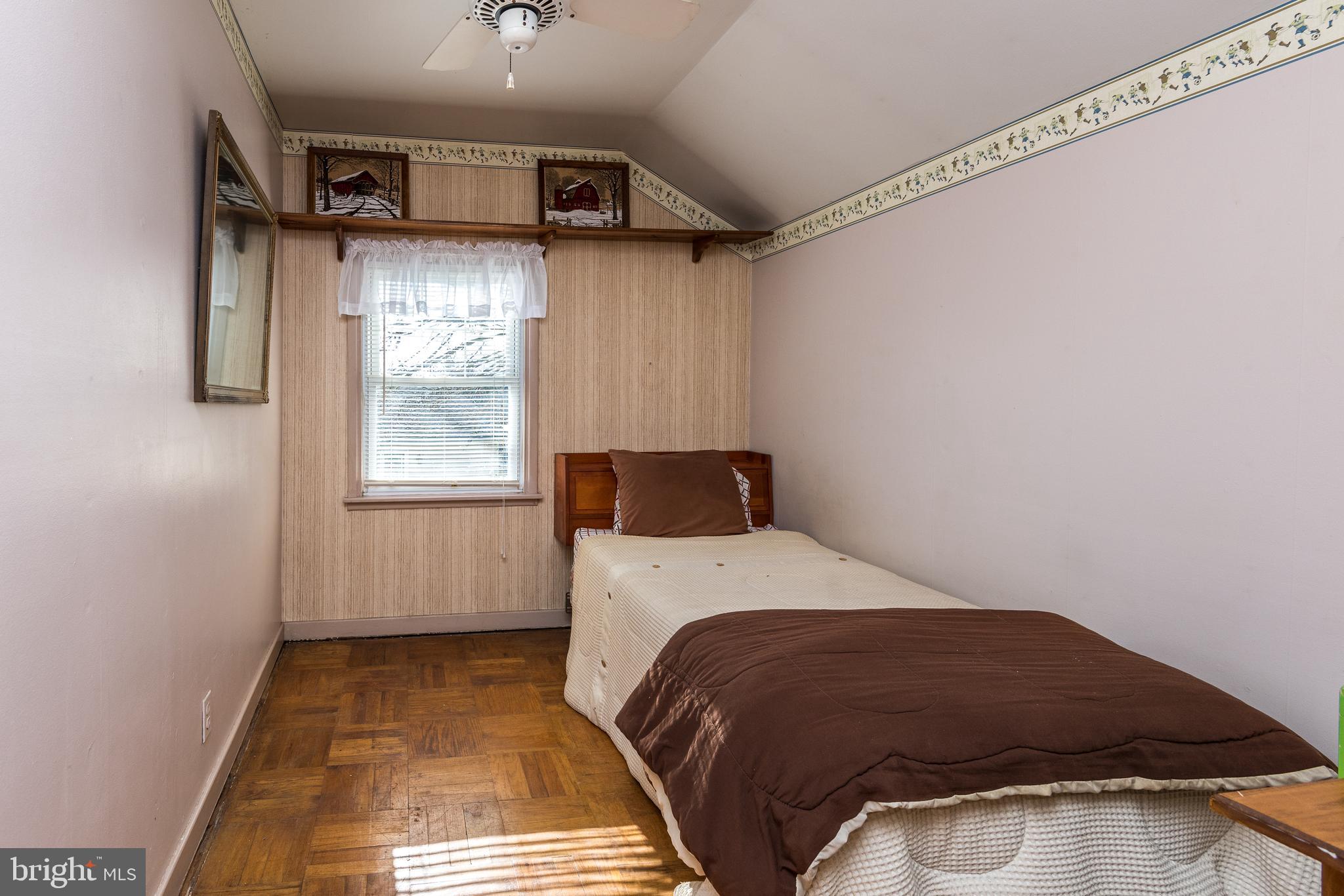 1228 Cambridge Road Warminster, PA 18974 - Photo 17 of 23 a bedroom with a bed and a window