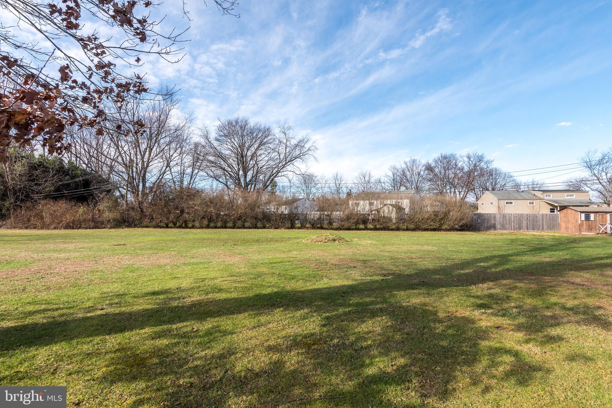 1228 Cambridge Road Warminster, PA 18974 - Photo 23 of 23 a view of a field with an trees