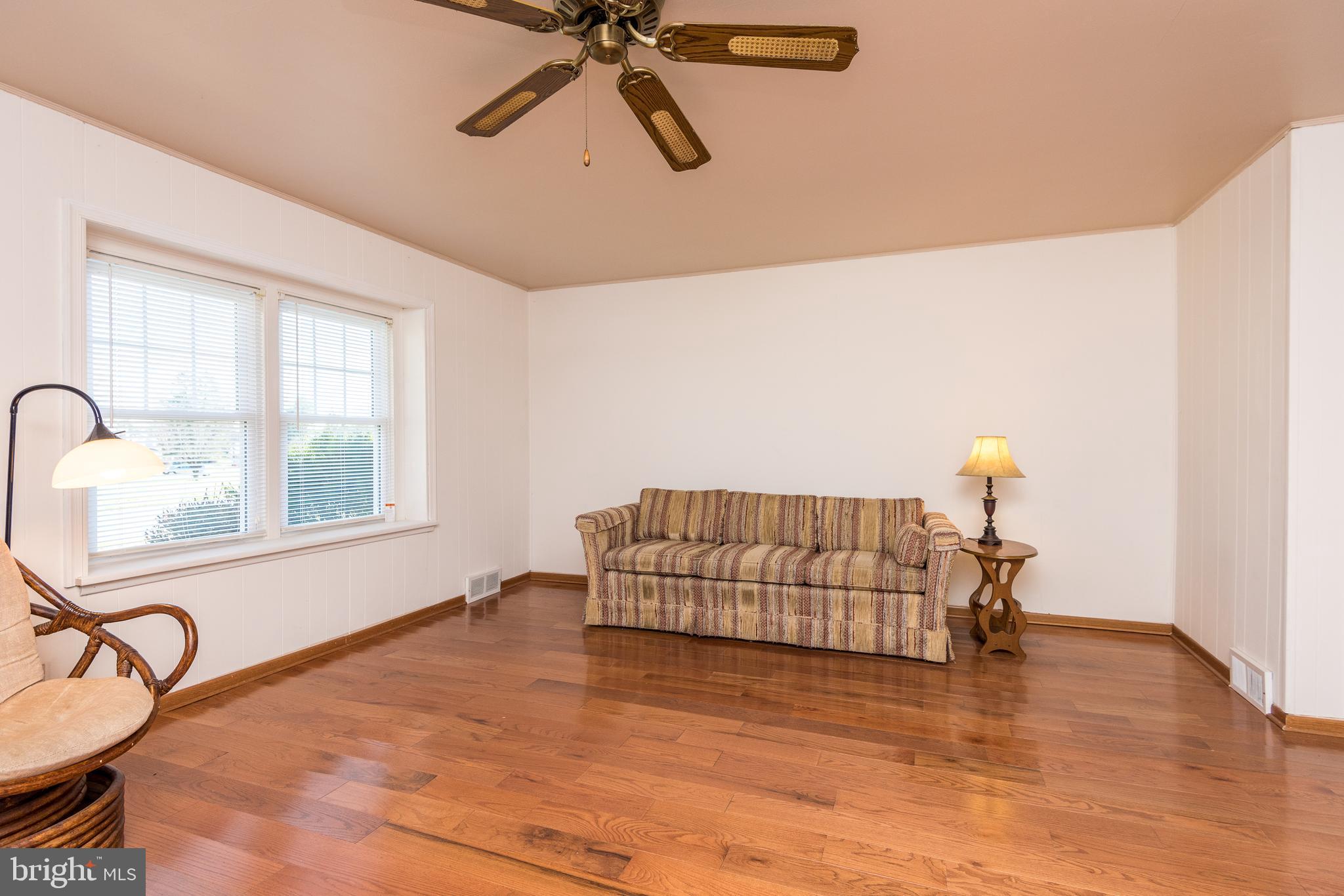 1228 Cambridge Road Warminster, PA 18974 - Photo 4 of 23 a bedroom with a bed and window