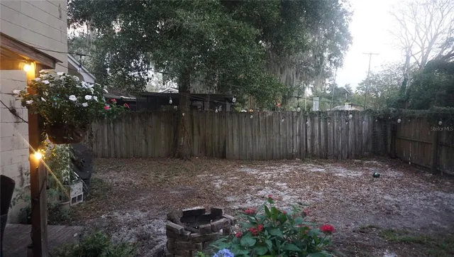 a backyard of a house with lots of green space