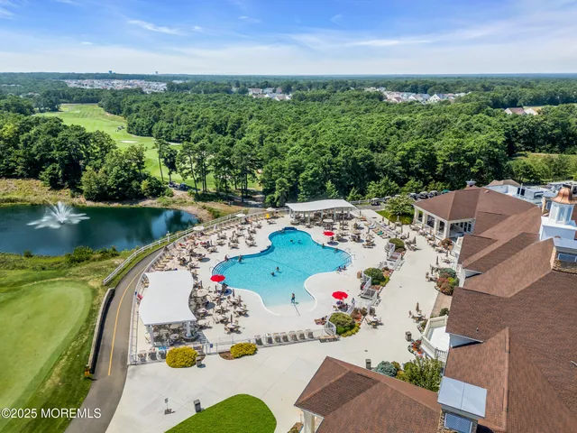 an aerial view of a house with a garden