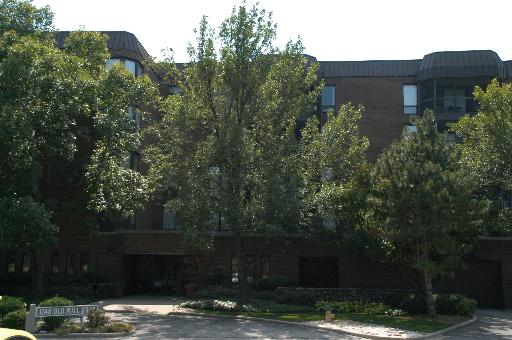 1140 Old Mill Road, Unit 503F Hinsdale, IL 60521 - Photo 1 of 1 a view of house with yard and green space