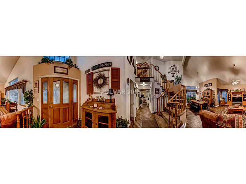 161 West Rochell Drive Henderson, NV 89015 - Photo 8 of 35 Entry Hall. This panoramic shoot really showing the open concept of this home and amazing vaulted ceilings, window abound creating amazing natural light.