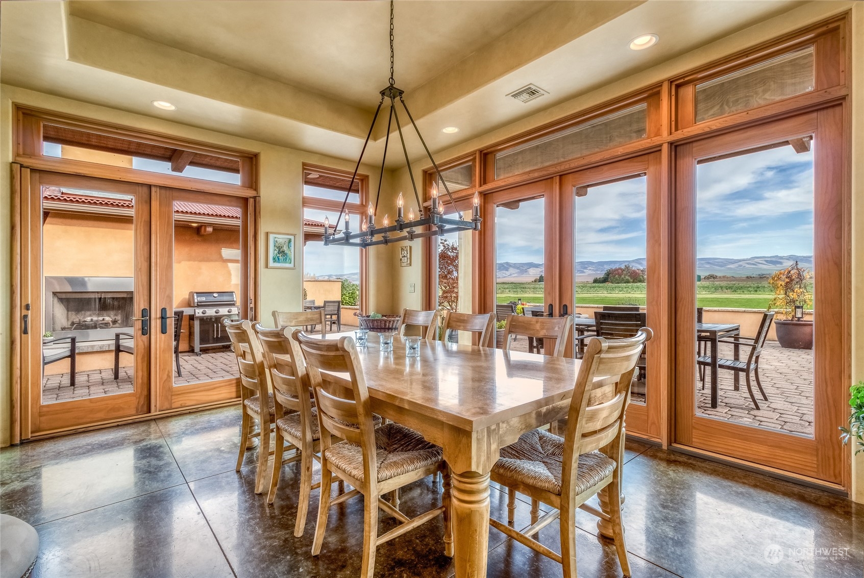1648 Stateline Road Walla Walla, WA 99362 - Photo 17 of 40 a view of a dining room with furniture window and wooden floor