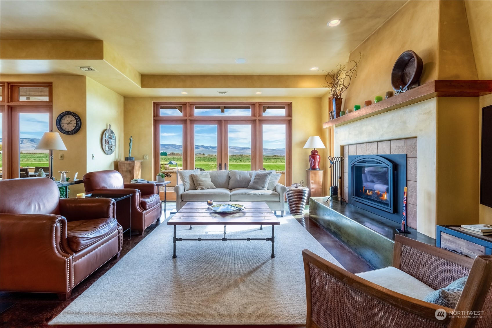 1648 Stateline Road Walla Walla, WA 99362 - Photo 8 of 40 a living room with fireplace furniture and a large window