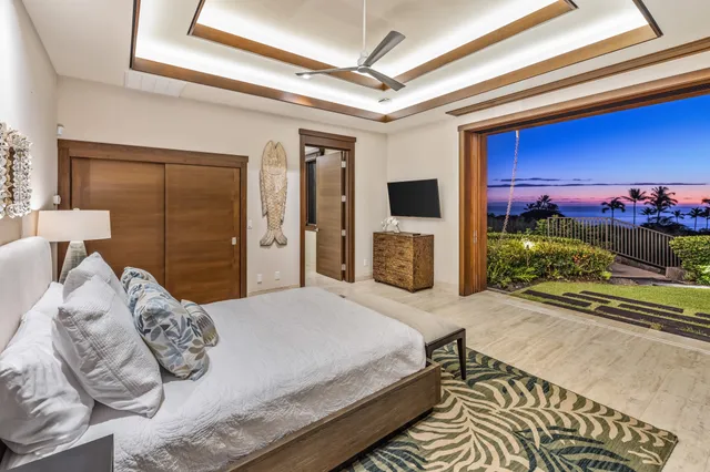 a bedroom with a bed and a fireplace