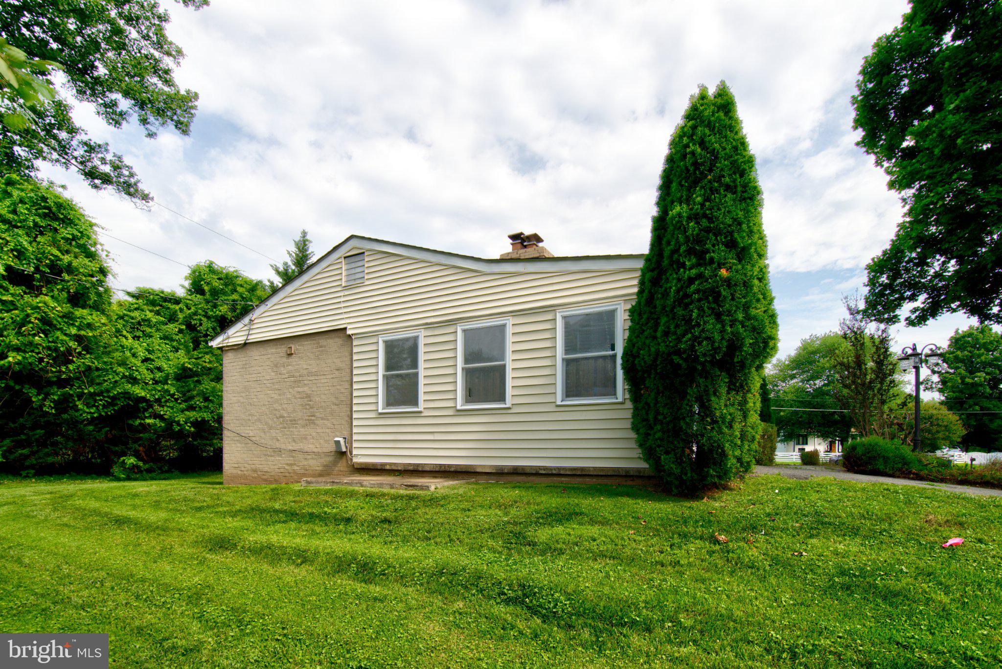 900 Walker Road Great Falls, VA 22066 - Photo 51 of 52 Charming home nestled in lush greenery.