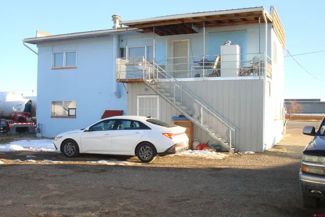a car parked in front of a house