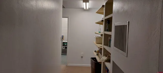 a view of hallway with stairs