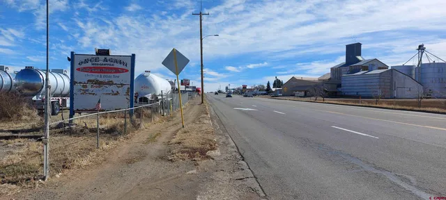 a view of a house with a road