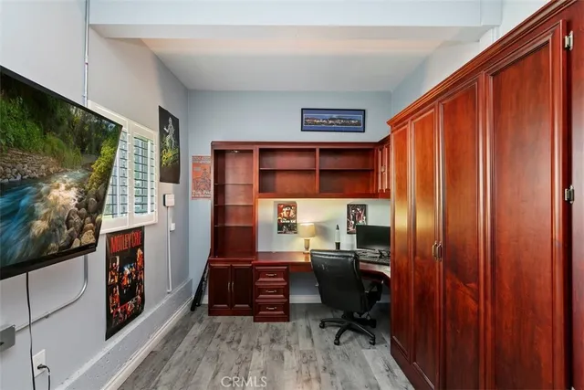 a room with furniture and a flat screen tv