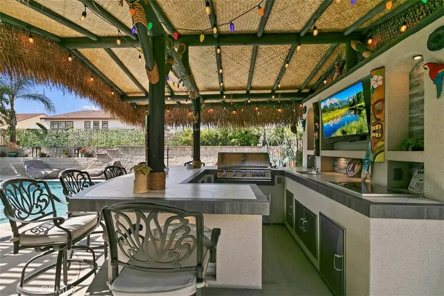 a view of a chairs and table in the patio