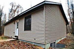 N1520 Spring Glen Road Menominee, WI 54135 - Photo 8 of 44 Rear