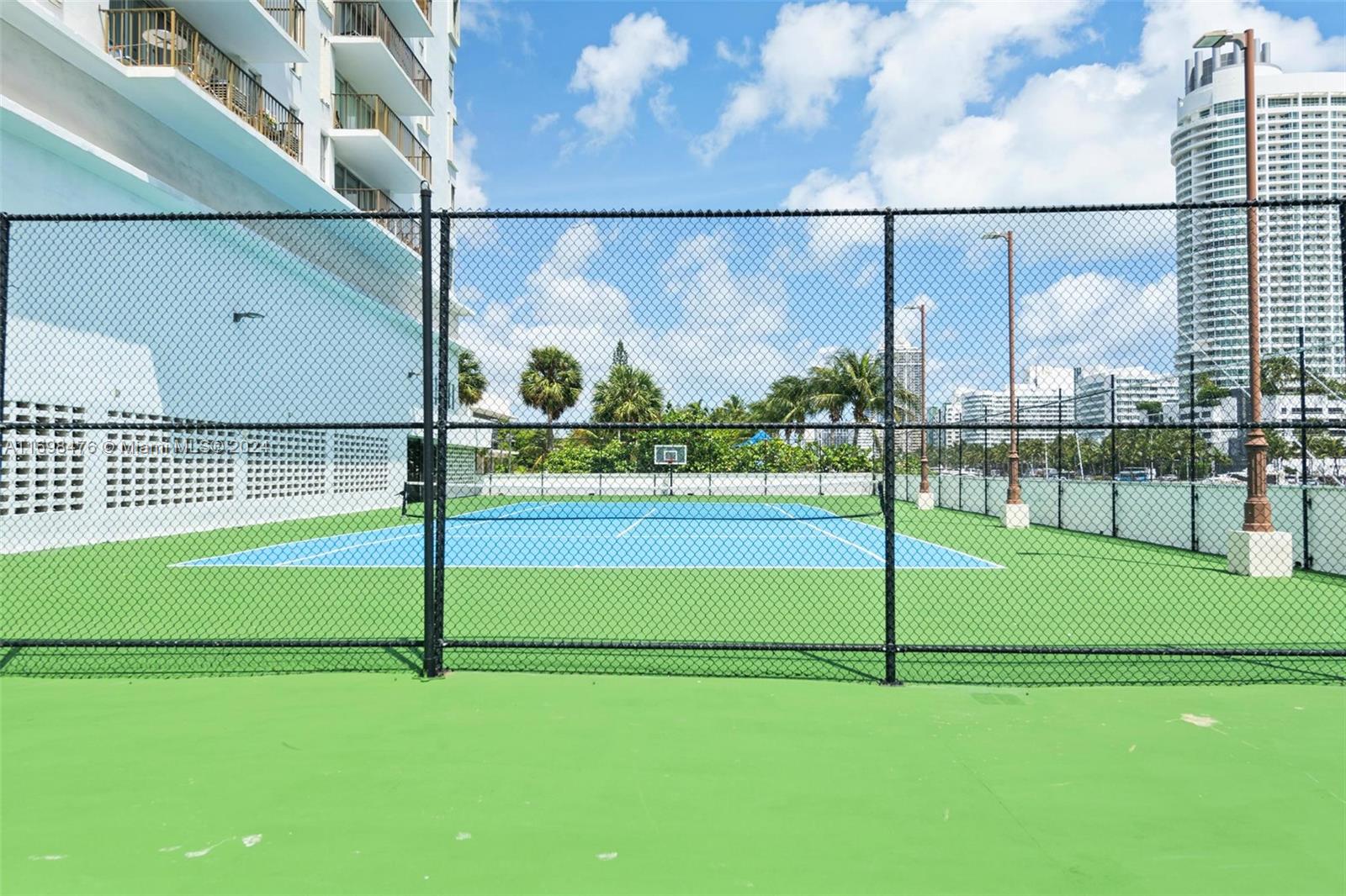 4101 Pine Tree Drive, Unit 1702 Miami Beach, FL 33140 - Photo 44 of 51 a view of a tennis court