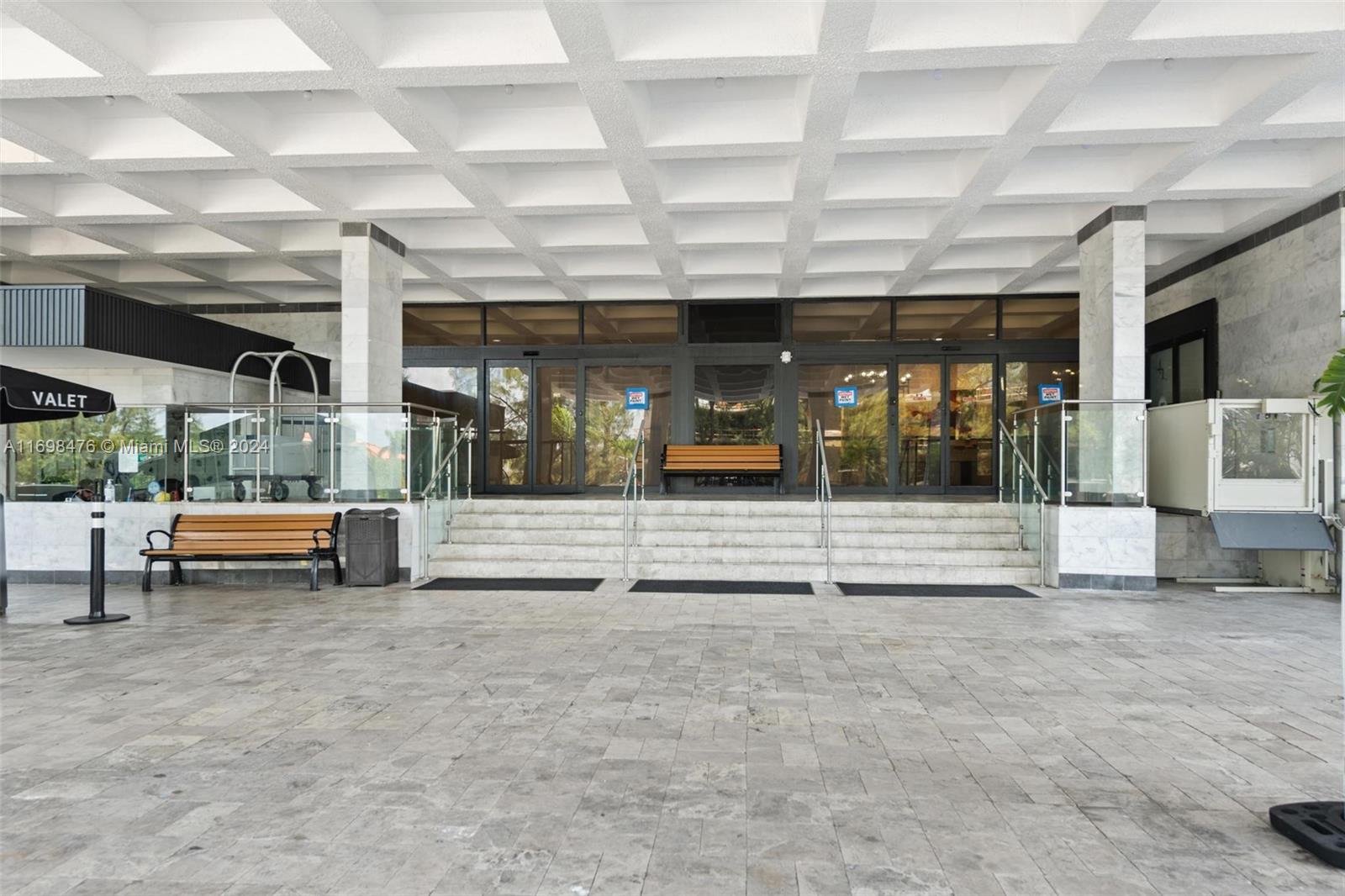 4101 Pine Tree Drive, Unit 1702 Miami Beach, FL 33140 - Photo 48 of 51 a view of a building with a patio