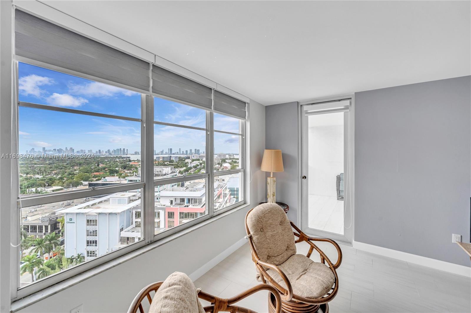 4101 Pine Tree Drive, Unit 1702 Miami Beach, FL 33140 - Photo 6 of 51 a room with furniture window and outside view
