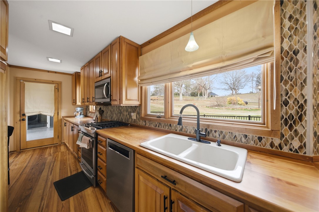 1531 Highway 252 Laurens, SC 29360 - Photo 12 of 40 This charming kitchen offers abundant natural light and rustic warmth.