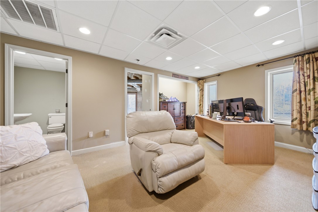 1531 Highway 252 Laurens, SC 29360 - Photo 16 of 40 This versatile space offers comfort and functionality for various activities, perfect for a home office or recreation.