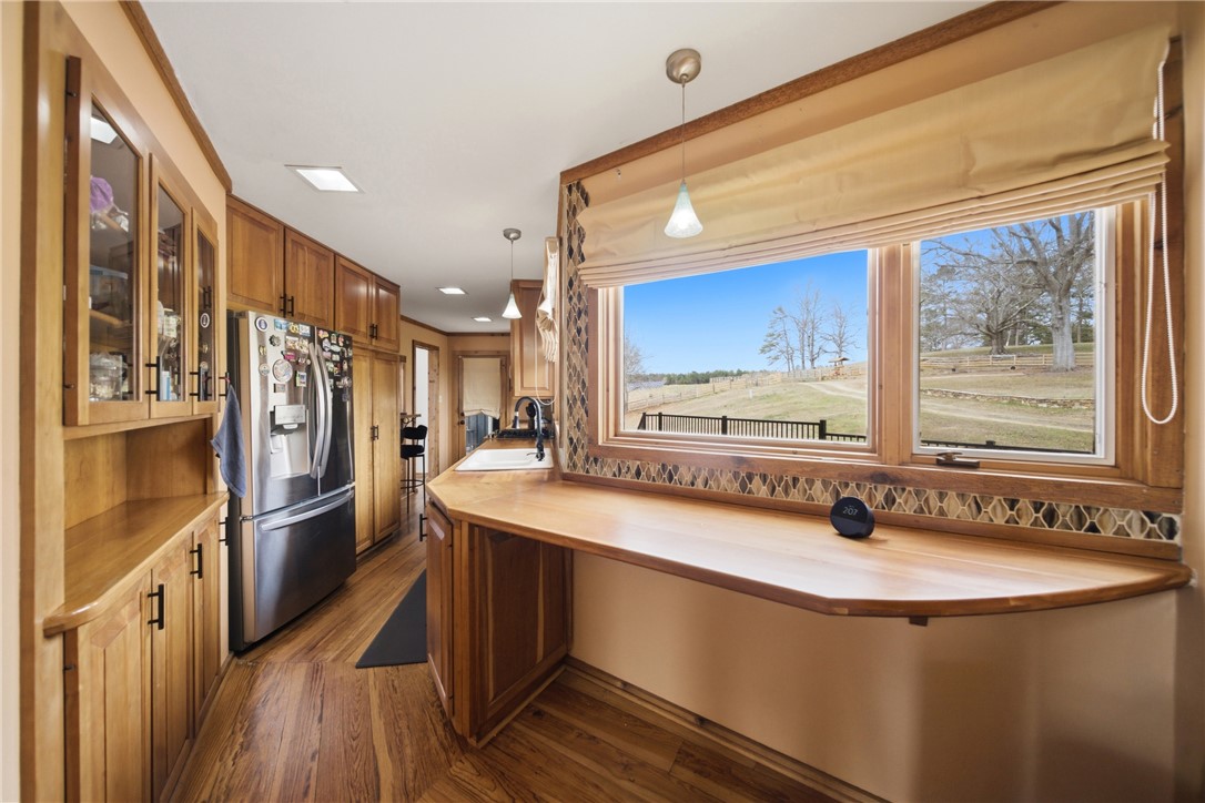 1531 Highway 252 Laurens, SC 29360 - Photo 18 of 40 This bright kitchen offers a serene view, ideal for culinary inspiration.