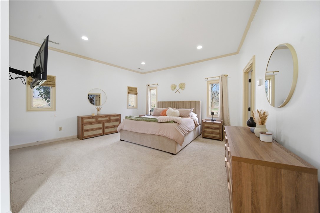 1531 Highway 252 Laurens, SC 29360 - Photo 2 of 40 This expansive bedroom offers high ceilings and abundant natural light.