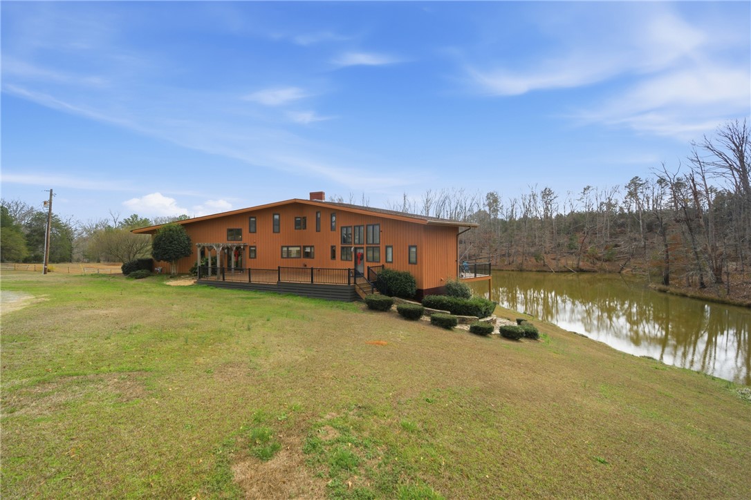 1531 Highway 252 Laurens, SC 29360 - Photo 31 of 40 This private retreat offers expansive views of a tranquil pond, perfect for serene living.
